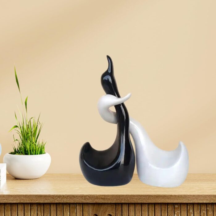Modern Ceramic Swan Couple Figurine Set – Black & White Glossy Hugging Love Birds Home Decor Showpiece for Living Room, Bedroom, Office, Gifting (Pack of 2)